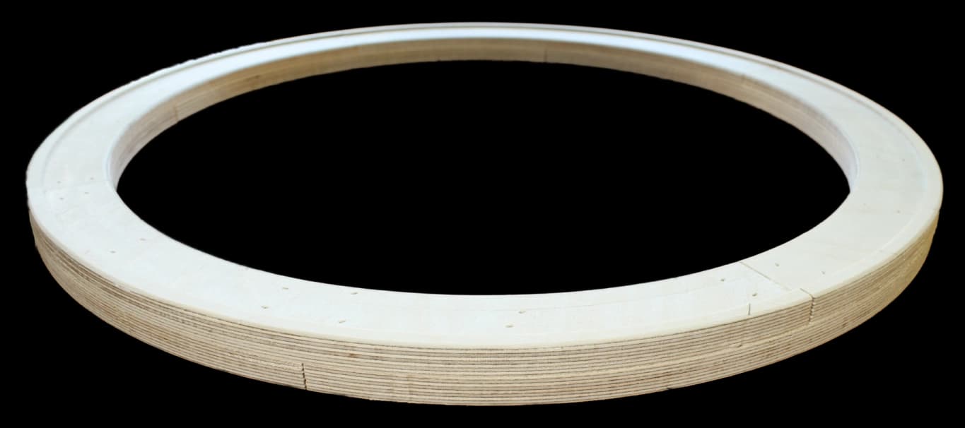Side profile view of a birch plywood round frame showing frame thickness and quality